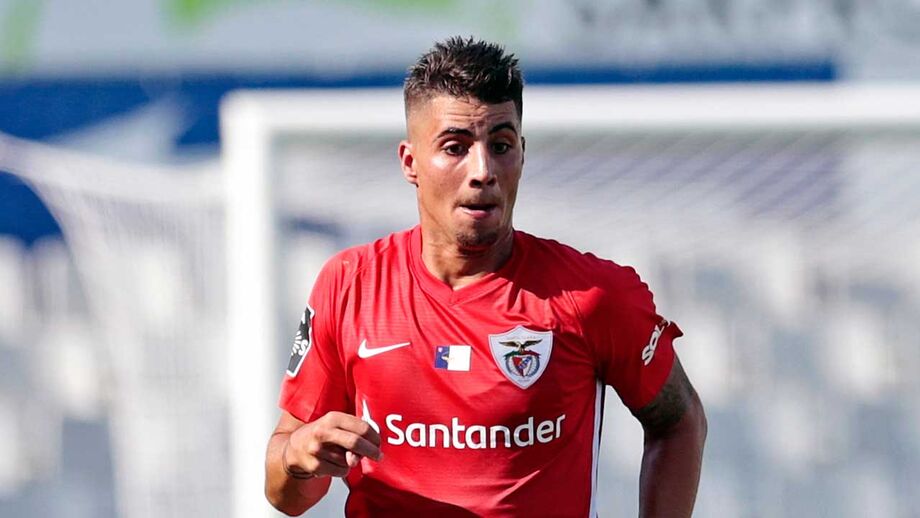 Fábio Cardoso e Schettine na mesa do Benfica