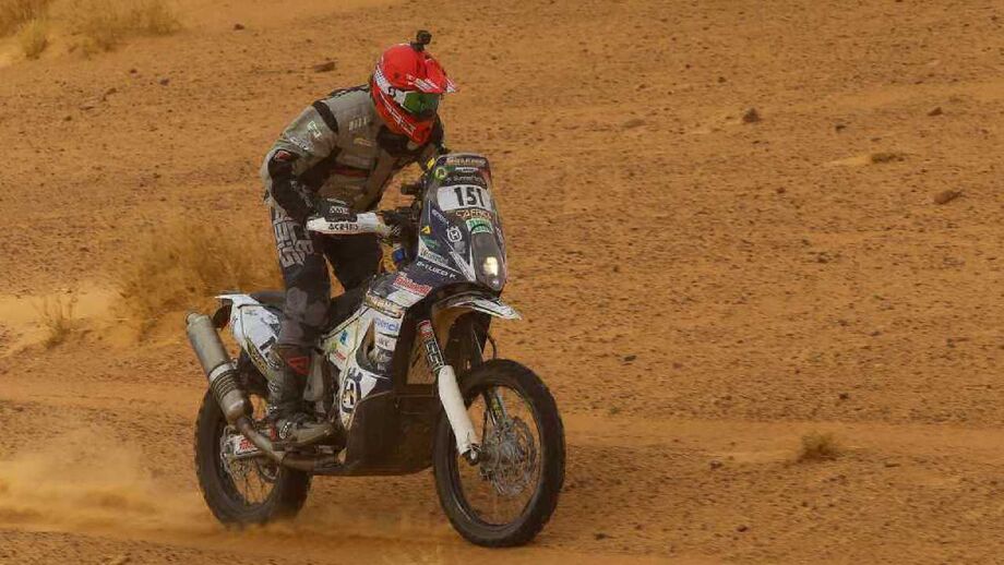 Paolo Lucci e Patrice Etienne festejam na penúltima etapa da Africa Eco Race