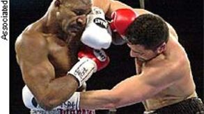 John Ruiz «rouba» título mundial de pesados a Evander Holyfield