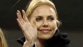 Charlize Theron aplaude Nadal