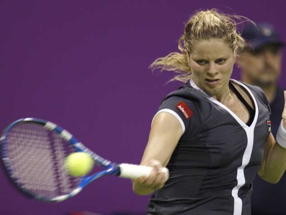 Clijsters estreia-se com vitória tranquila
