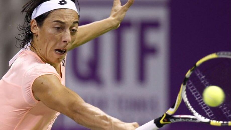Schiavone triunfa no adeus a Doha