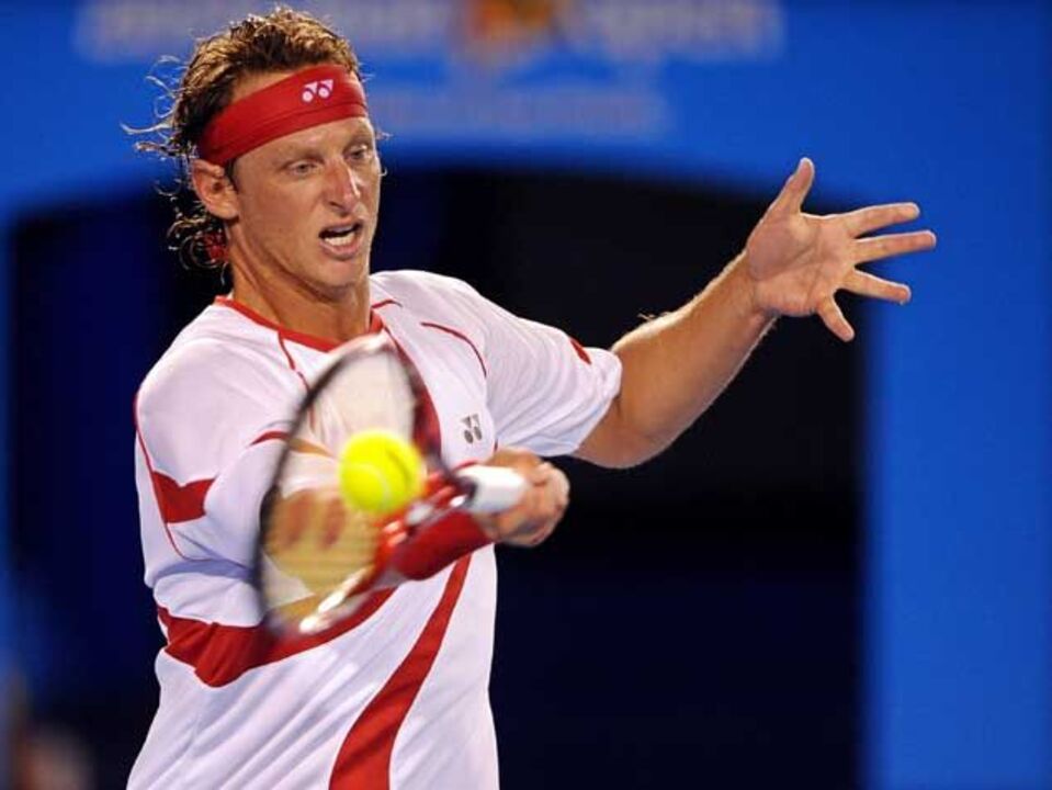 Nalbandian supera Hewitt em longa batalha