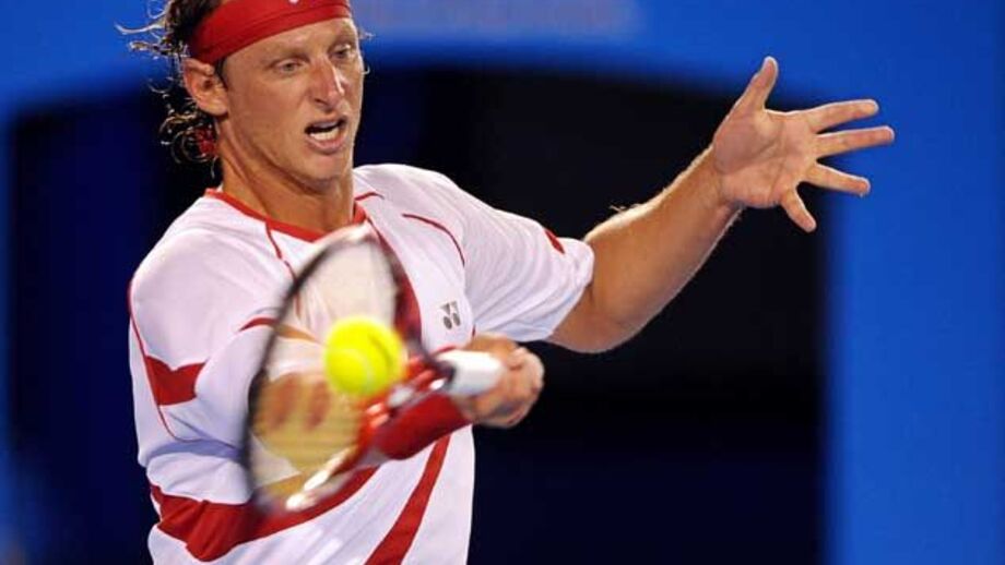 Nalbandian supera Hewitt em longa batalha