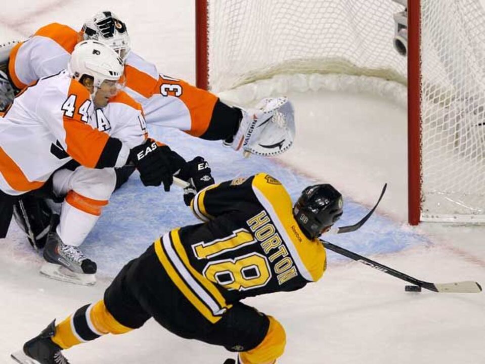 NHL: Campeões estreiam-se a vencer