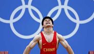 Chinês Qingfeng Lin conquista ouro em -69kg