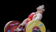 Chinês Qingfeng Lin conquista ouro em -69kg