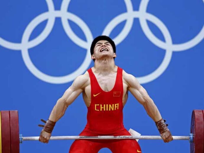 Chinês Qingfeng Lin conquista ouro em -69kg