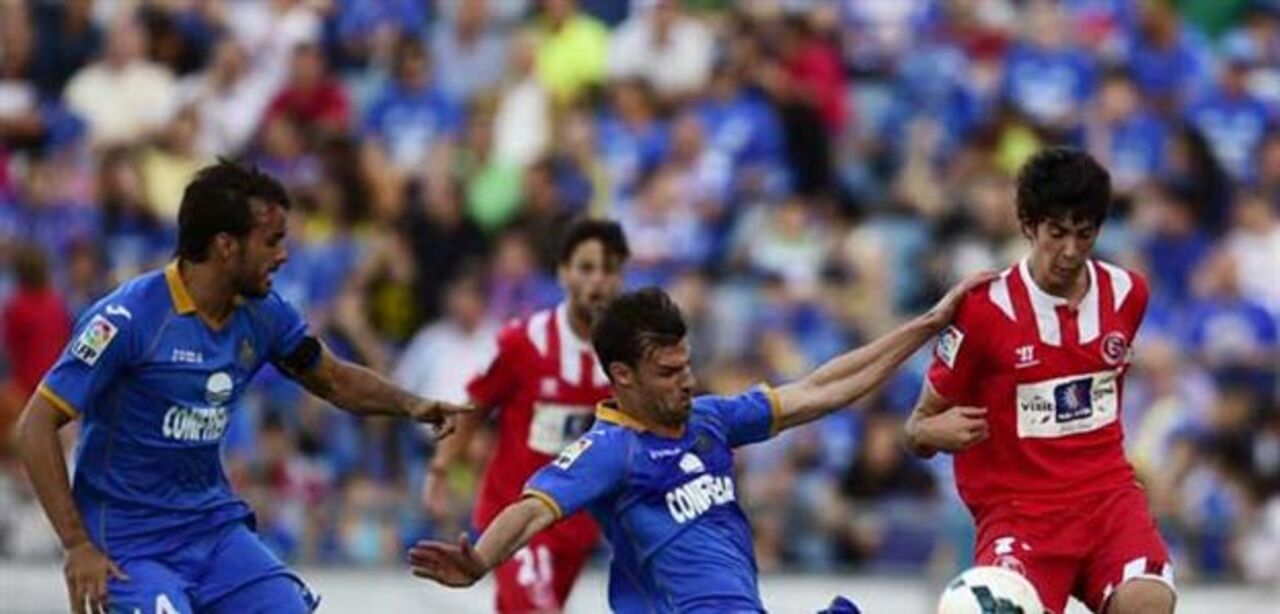 Sevilha em Getafe com cabeça está em Turim