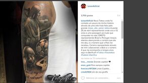 Luisão tatua a Ponte 25 de abril no braço direito