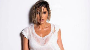 Atriz brasileira publica foto em t-shirt molhada e provoca revolução