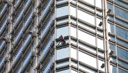 'Homem-aranha' escala arranha-céus em Hong Kong para apelar à paz