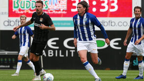 Adam Reach na sombra