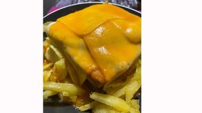 Francesinha apreciada em casa