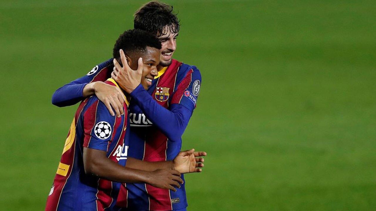 Trincão festeja com Ansu Fati 