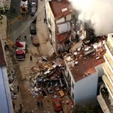 Imagens de drone mostram prédio que desabou após explosão no centro de Lisboa		