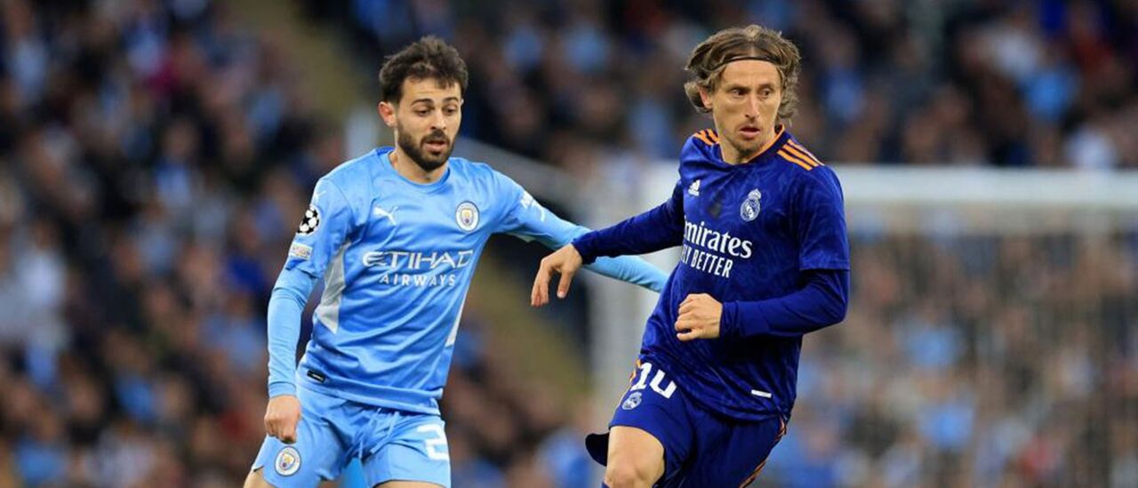 Bernardo Silva e Modric durante o jogo da 1.ª mão