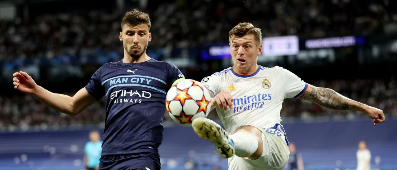 Rúben Dias com Toni Kroos na 2.ª mão da época passada