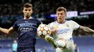Rúben Dias com Toni Kroos na 2.ª mão da época passada