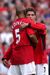 Rio Ferdinand com CR7 nesse jogo
