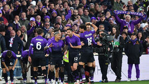 Jogadores da Fiorentina festejam golo marcado à Juventus