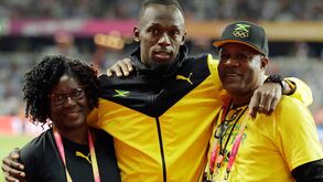 Usain Bolt com os pais