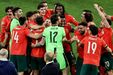 Jogadores da seleção portuguesa festejam uma vitória