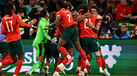 Jogadores de Portugal celebram na Allianz Arena.
