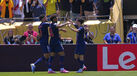 Jogadores celebram golo no jogo PSG contra Atlético de Madrid