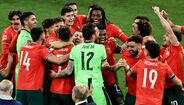 Jogadores da seleção portuguesa festejam uma vitória