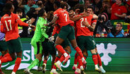 Jogadores de Portugal celebram na Allianz Arena.
