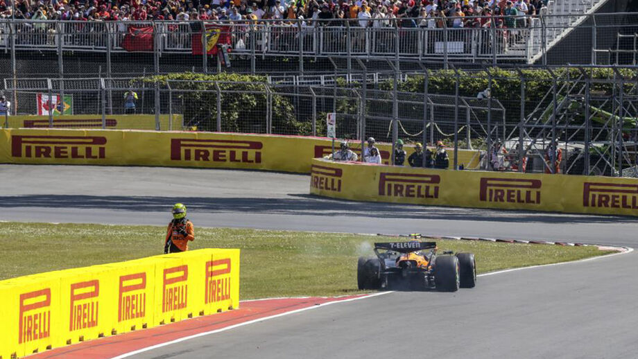 Lando Norris bate contra o muro no Grande Prémio do Canadá, após disputa com Oscar Piastri