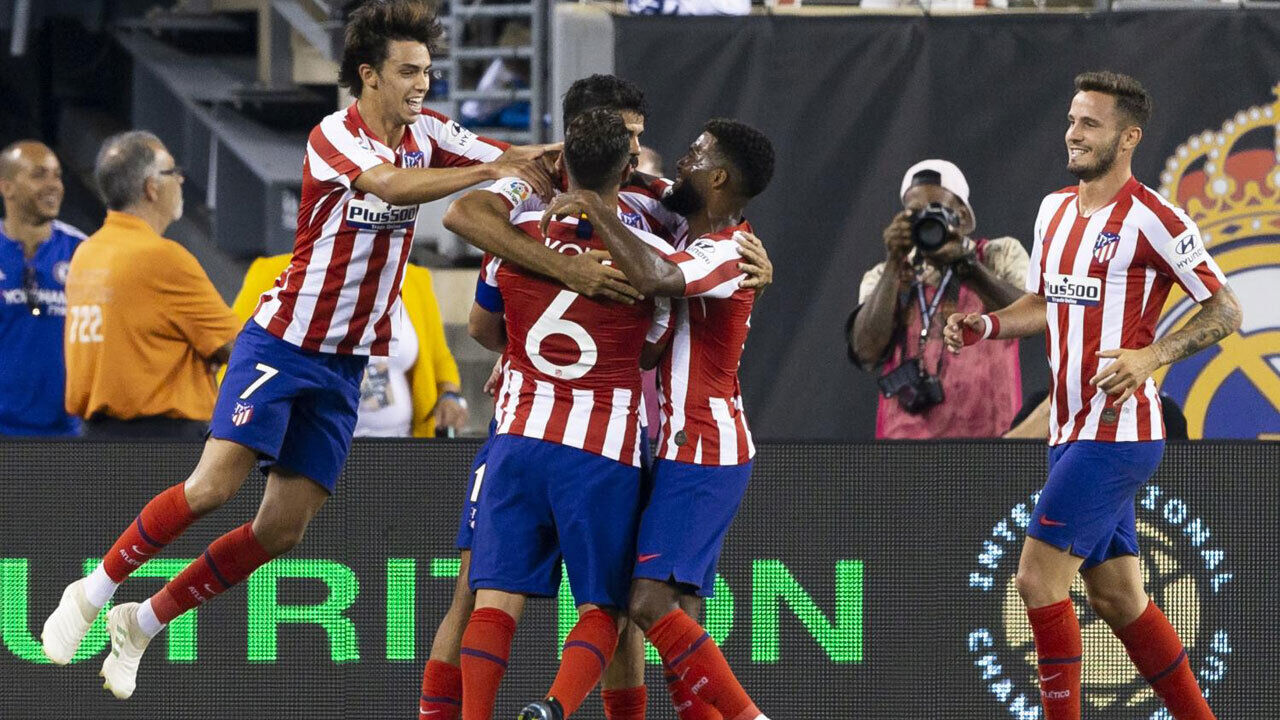 João Félix (à esquerda) e Saúl Níguez (à direita)