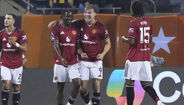 Jogadores do Manchester United a festejar