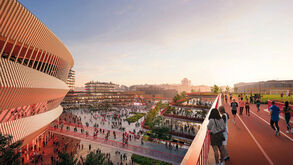 Multidão em espaço público perto de edifícios e pista de atletismo