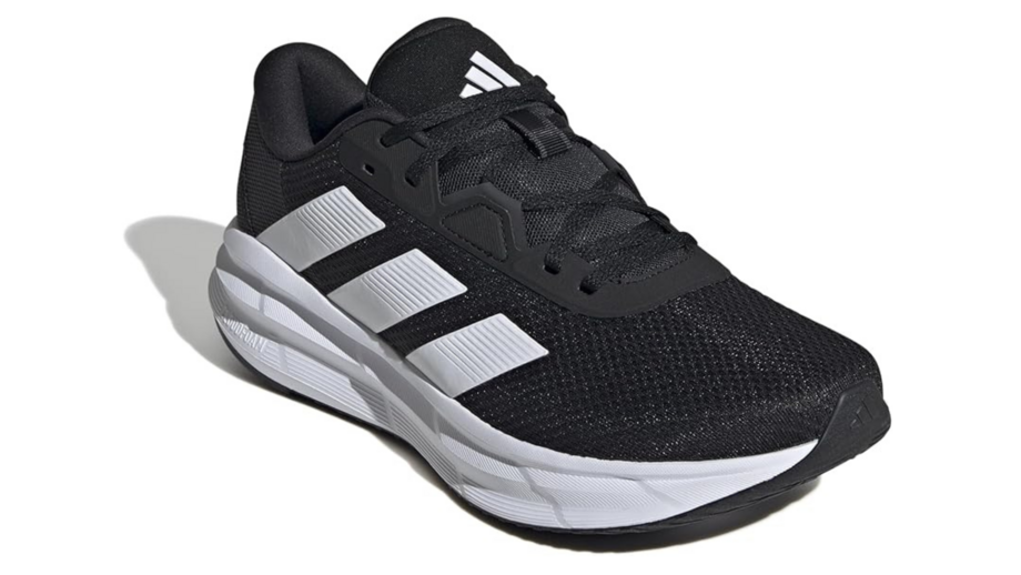 Sapatilhas pretas Adidas com listras brancas para corrida ou uso diário