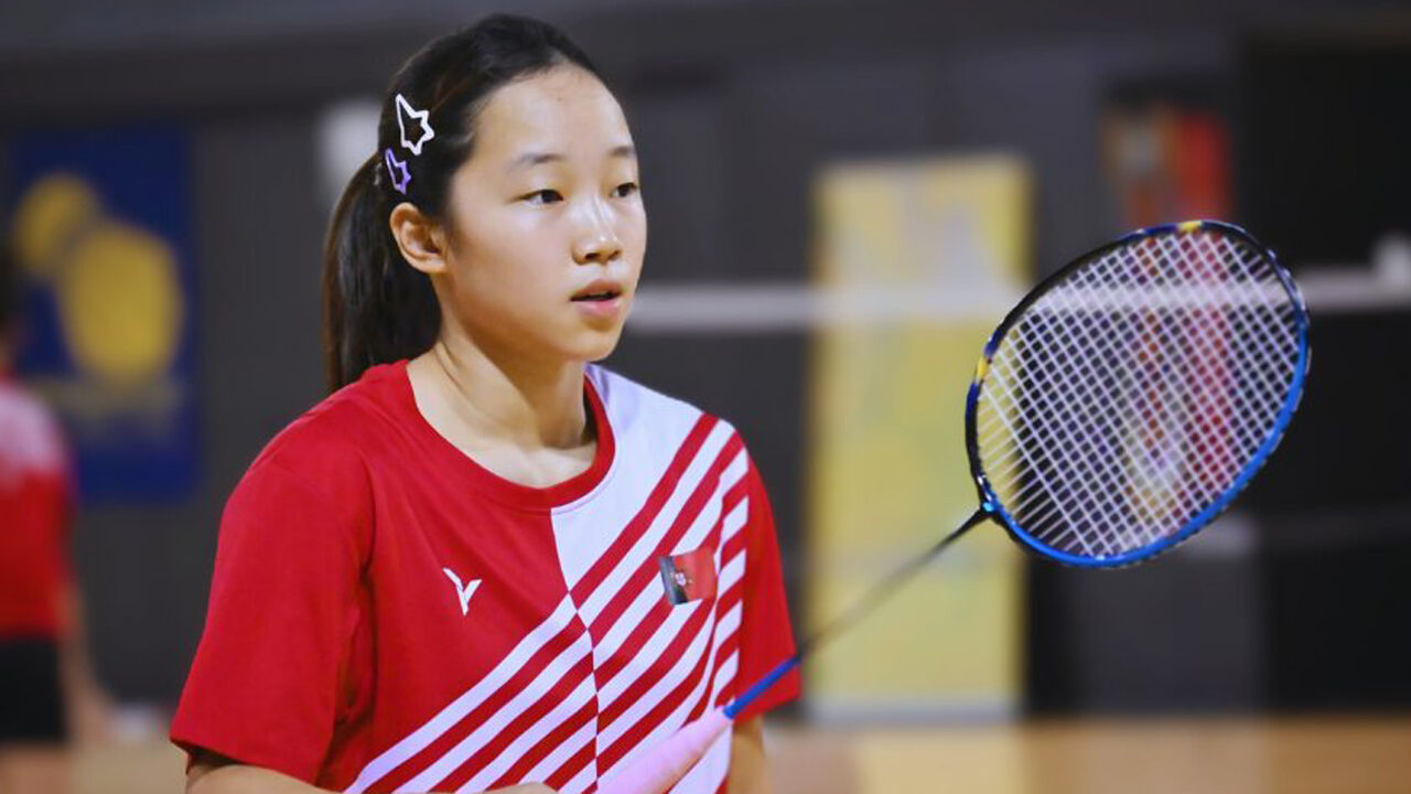 Hok In Lam em ação pela Seleção Nacional