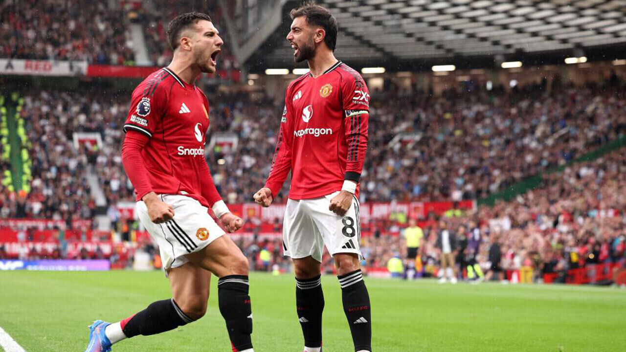 Diogo Dalot e Bruno Fernandes 