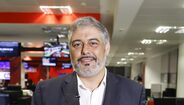 André Pinotes Batista com o Guia Record 2025/26