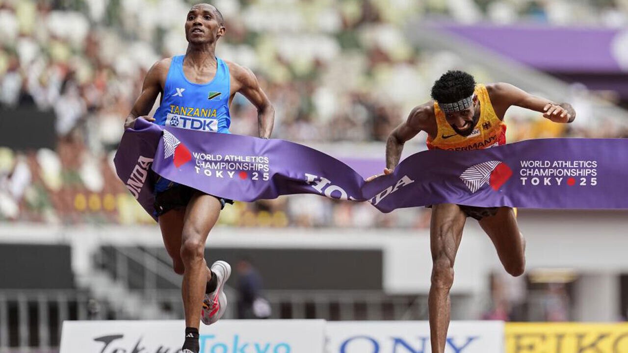 Alphonce Simbu e Iliass Aouani