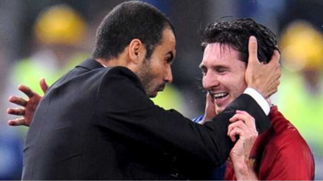 Guardiola e Messi celebram um momento