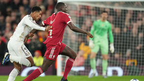 Os jogadores de Liverpool e Real Madrid em ação