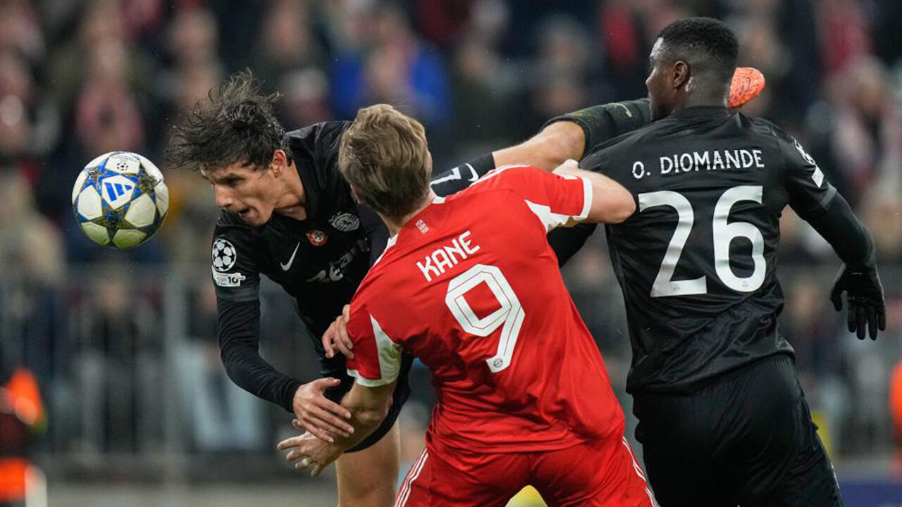 Jogo da Liga dos Campeões entre Bayern Munique e Sporting com Kane e Diomande