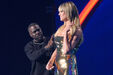 Heidi Klum apresenta sorteio do Mundial'2026 com Kevin Hart