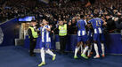 Jogadores do FC Porto festejam o golo apontado por William Gomes ao Estoril