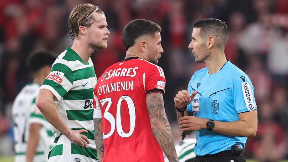 Otamendi à conversa com Hjulmand e com António Nobre, o árbitro do dérbi