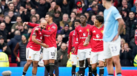Jogadores do Man. United festejam no jogo contra o Man. City