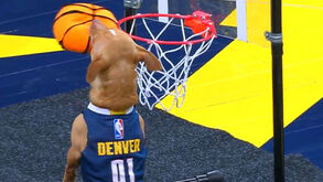 Já viu um cão a fazer um afundanço? Aconteceu ao intervalo de um jogo da NBA