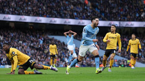 Os jogadores de Manchester City e Wolverhampton em ação