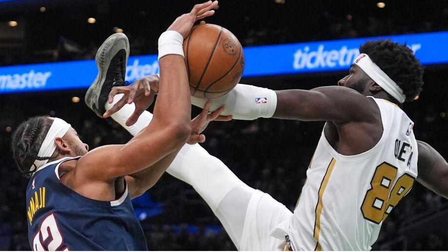 Neemias Queta em ação pelos Boston Celtics frente aos Nuggets